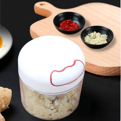 Small cut-and-pull garlic press